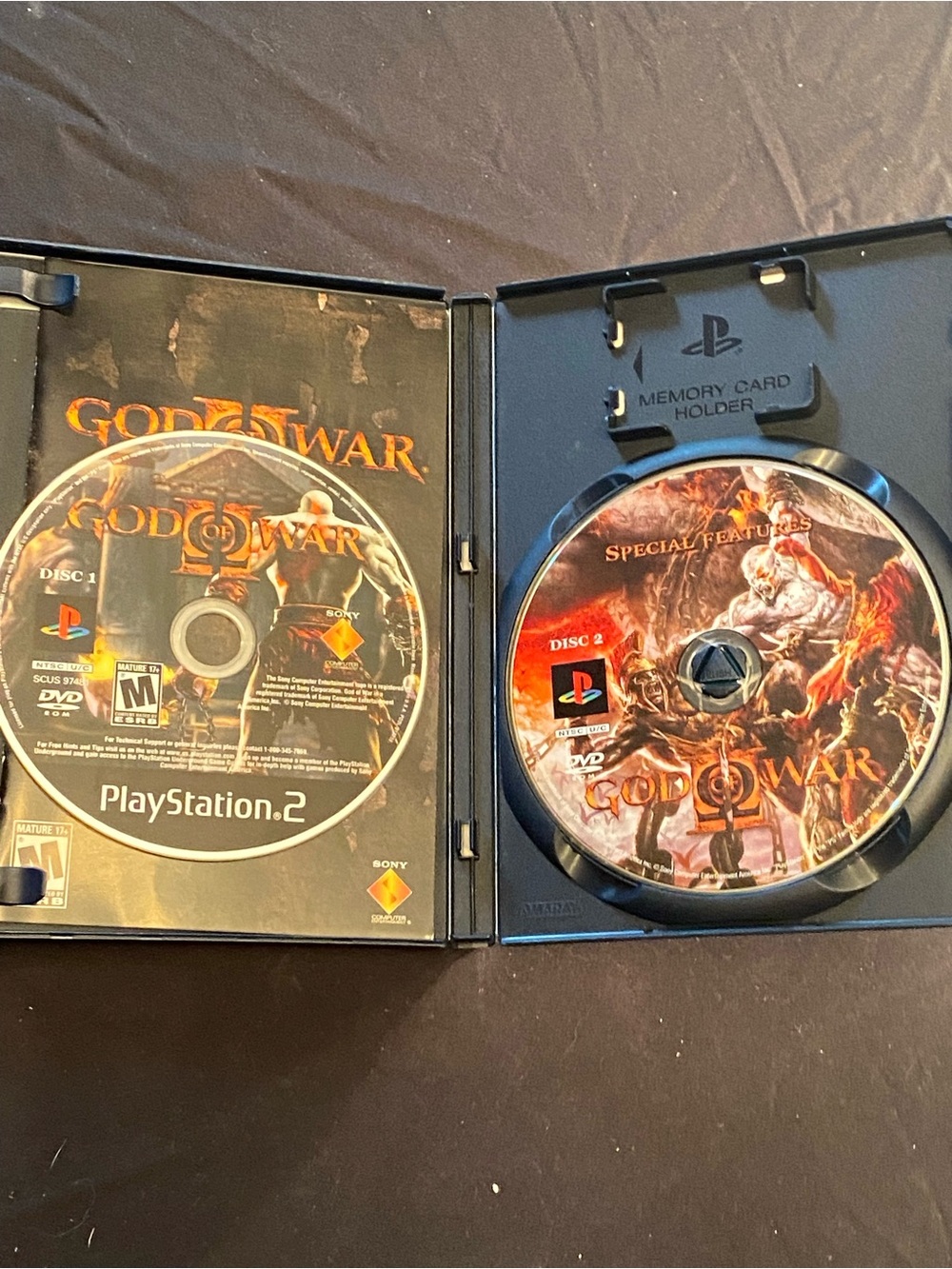 Sony PlayStation 2 God of War II Discs (Black, Red, Orange)